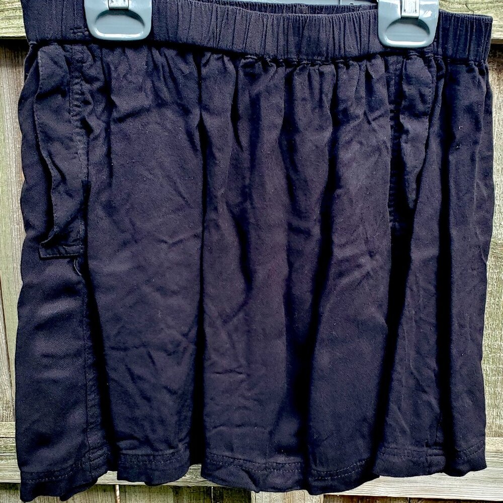 Black Cooperative pocket miniskirt